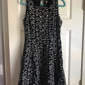 Kate Spade sleeveless bow pattern dress.